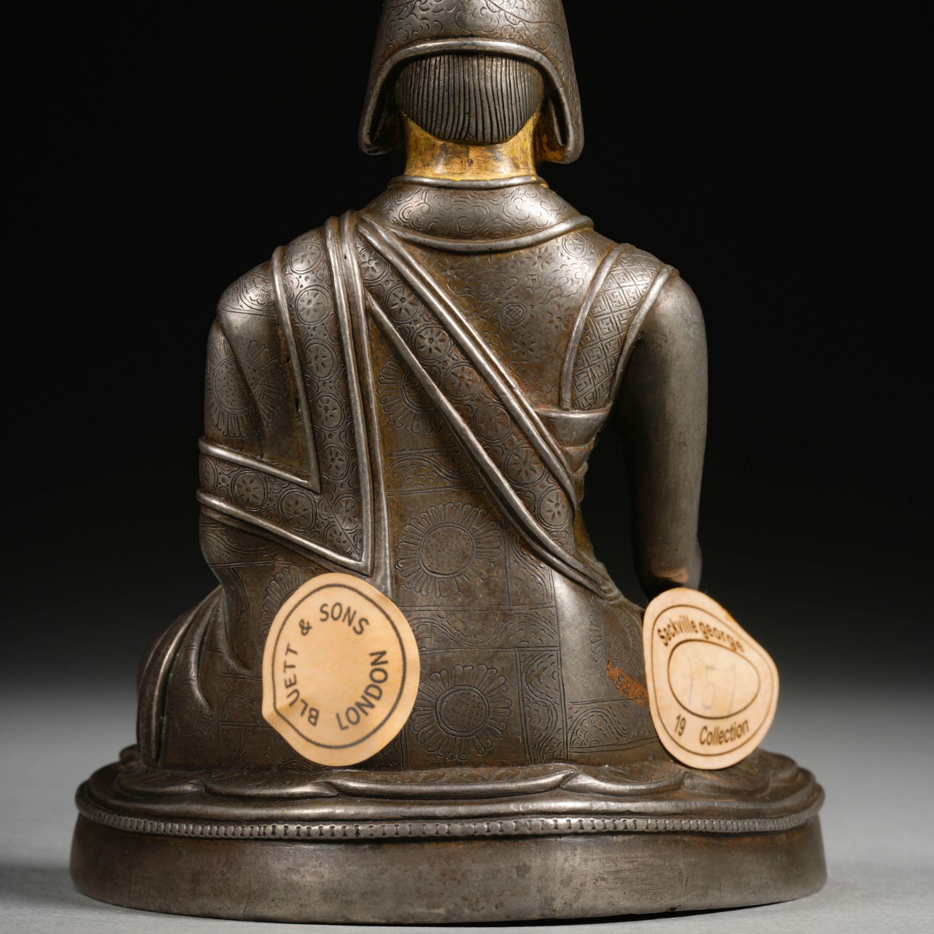 A Tibetan Bronze-gilt Seated Lama - Image 8 of 9