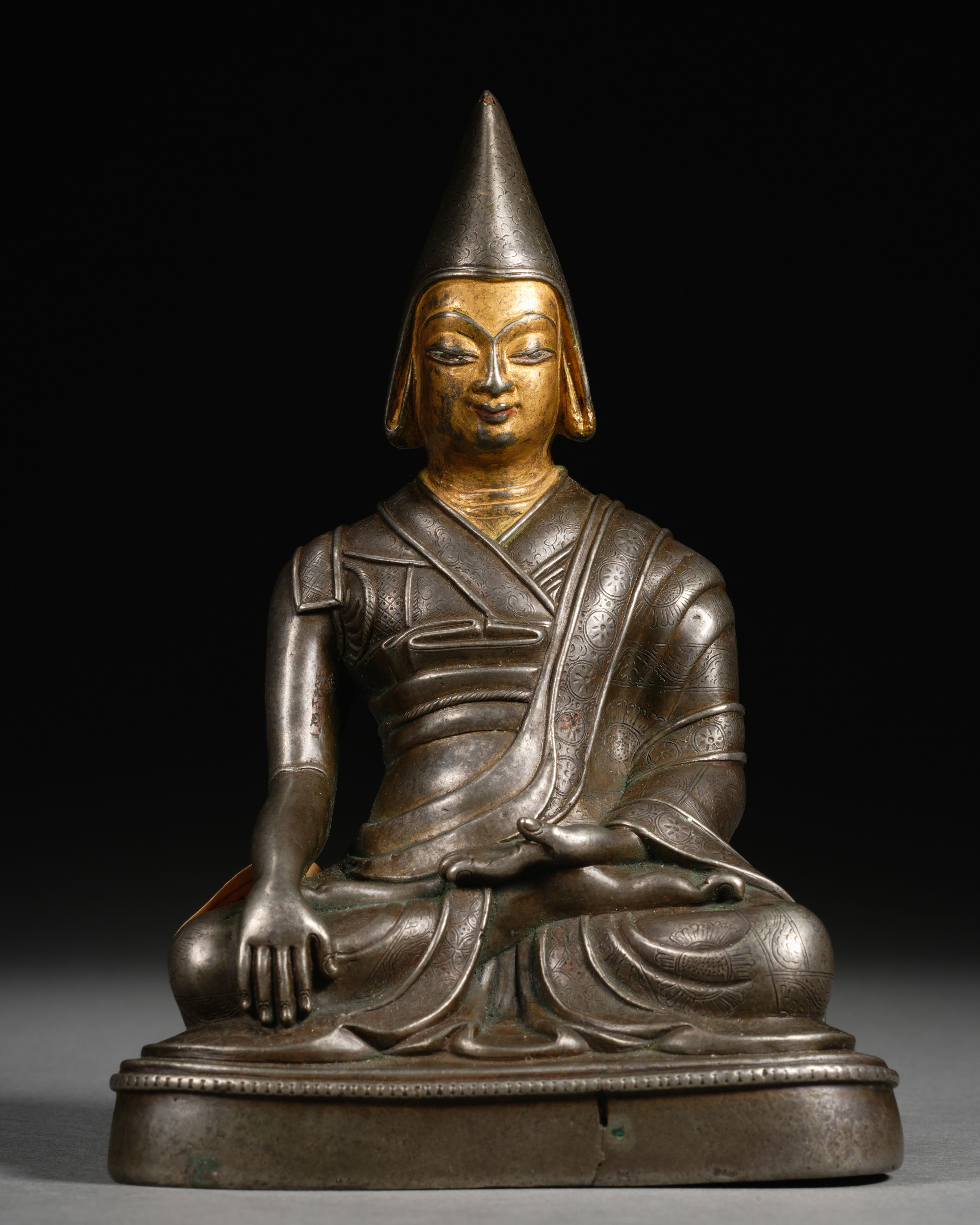 A Tibetan Bronze-gilt Seated Lama - Image 2 of 9