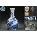 A Chinese Blue and White Floral and Bird Vase