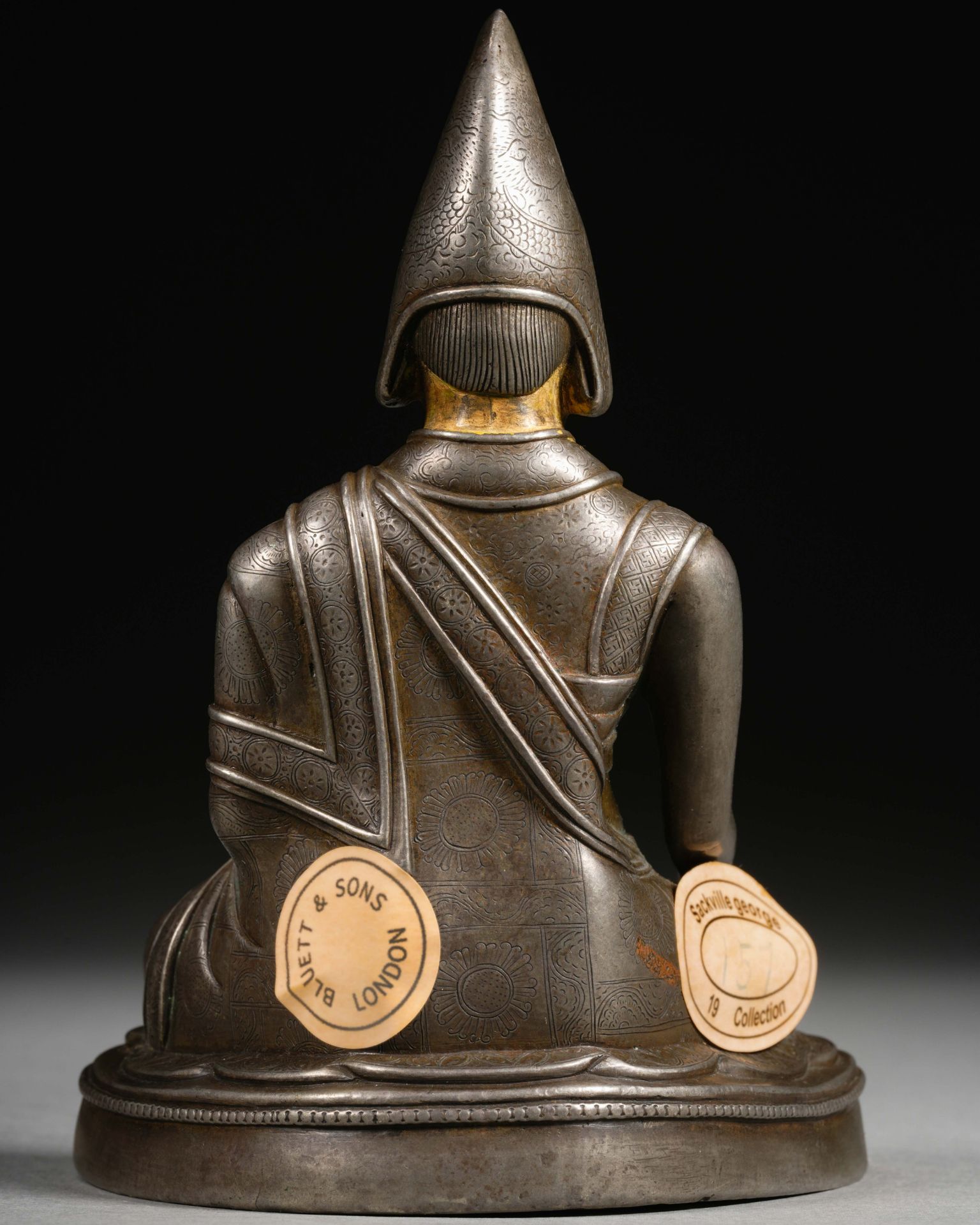 A Tibetan Bronze-gilt Seated Lama - Image 7 of 9