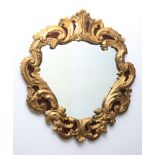 Florentiner Spiegel. Geschnitzt und vergoldet. 2. H. 19. Jh. 130 x 100 cm
