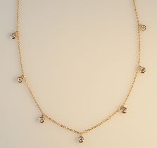 Brillant-Collier. Fünf Brillanten zus. 0,53 ct. Feines Weiß, vs. Erbskette. 18ct RG. L 45cm