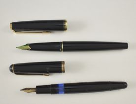 Zwei Montblanc-Füller. Einer für Patronen, einer mit Kolben. 14 ct. GG-Federn