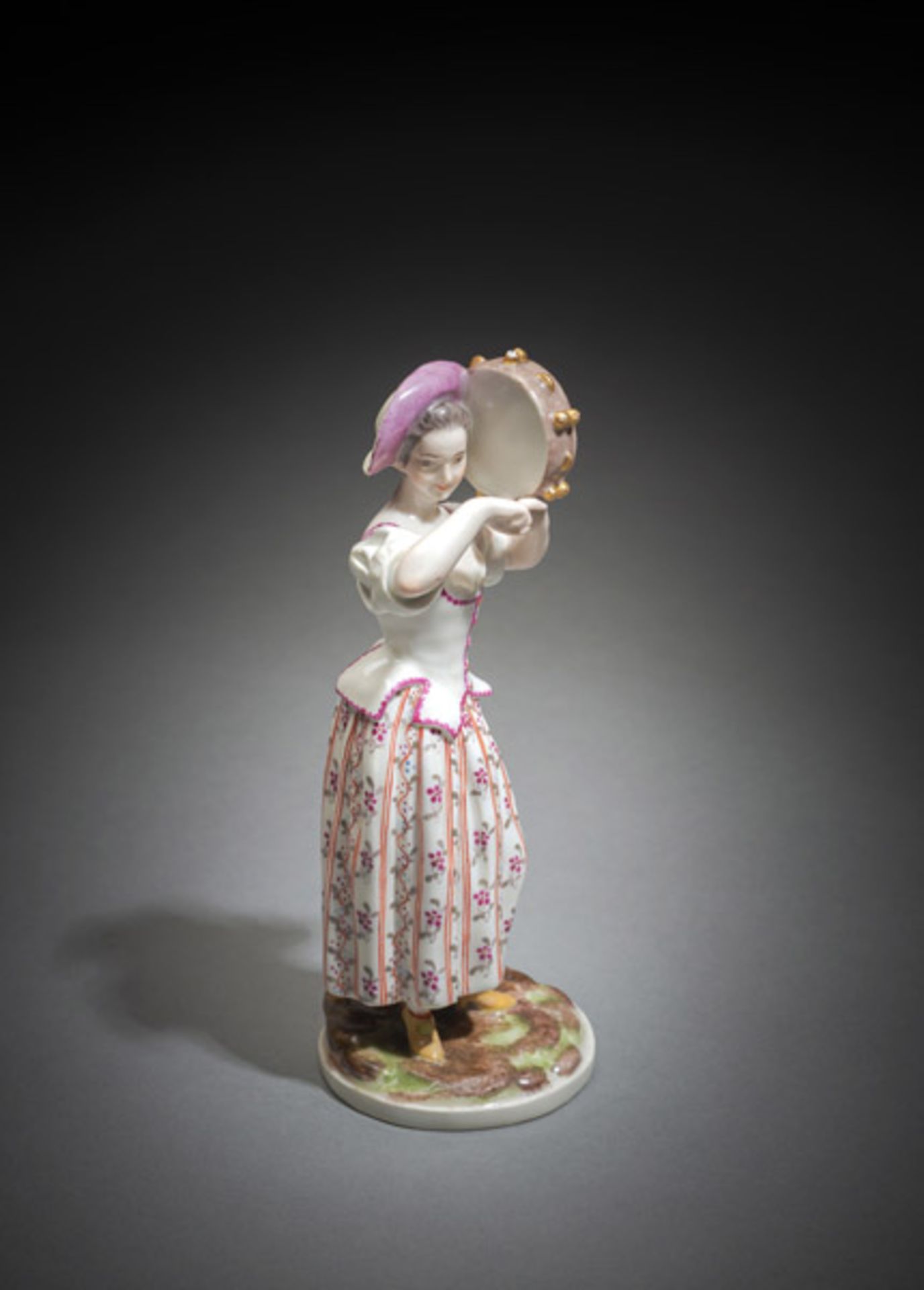 A ZURICH PORCELAIN FIGURE OF A GIRL WITH TAMBOURIN