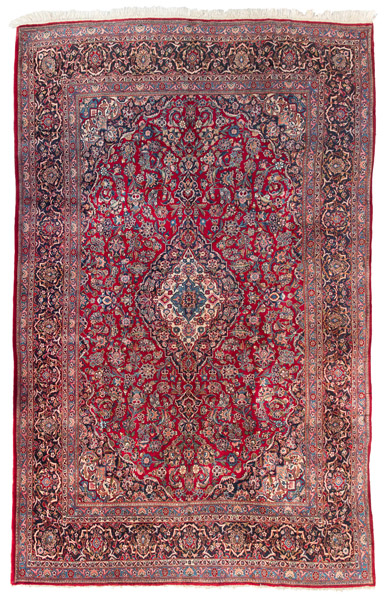A semi-antique Kashan carpet with central medallion