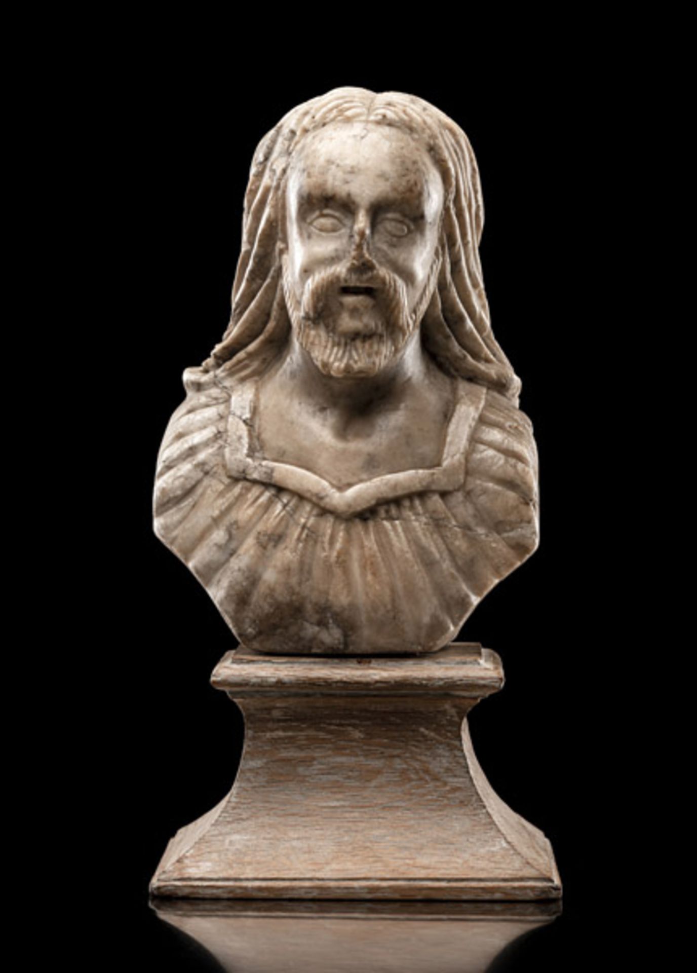 AN ITALIAN MARBLE BUST OF CHRIST