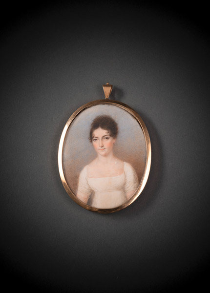 A PORTRAIT MINIATURE OF A YOUNG LADY IN A WHITE DRESS