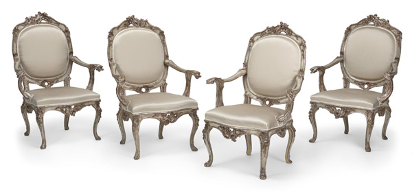 A SET OF FOUR GERMAN SILVERED AND GILTWOOD FAUTEUILS