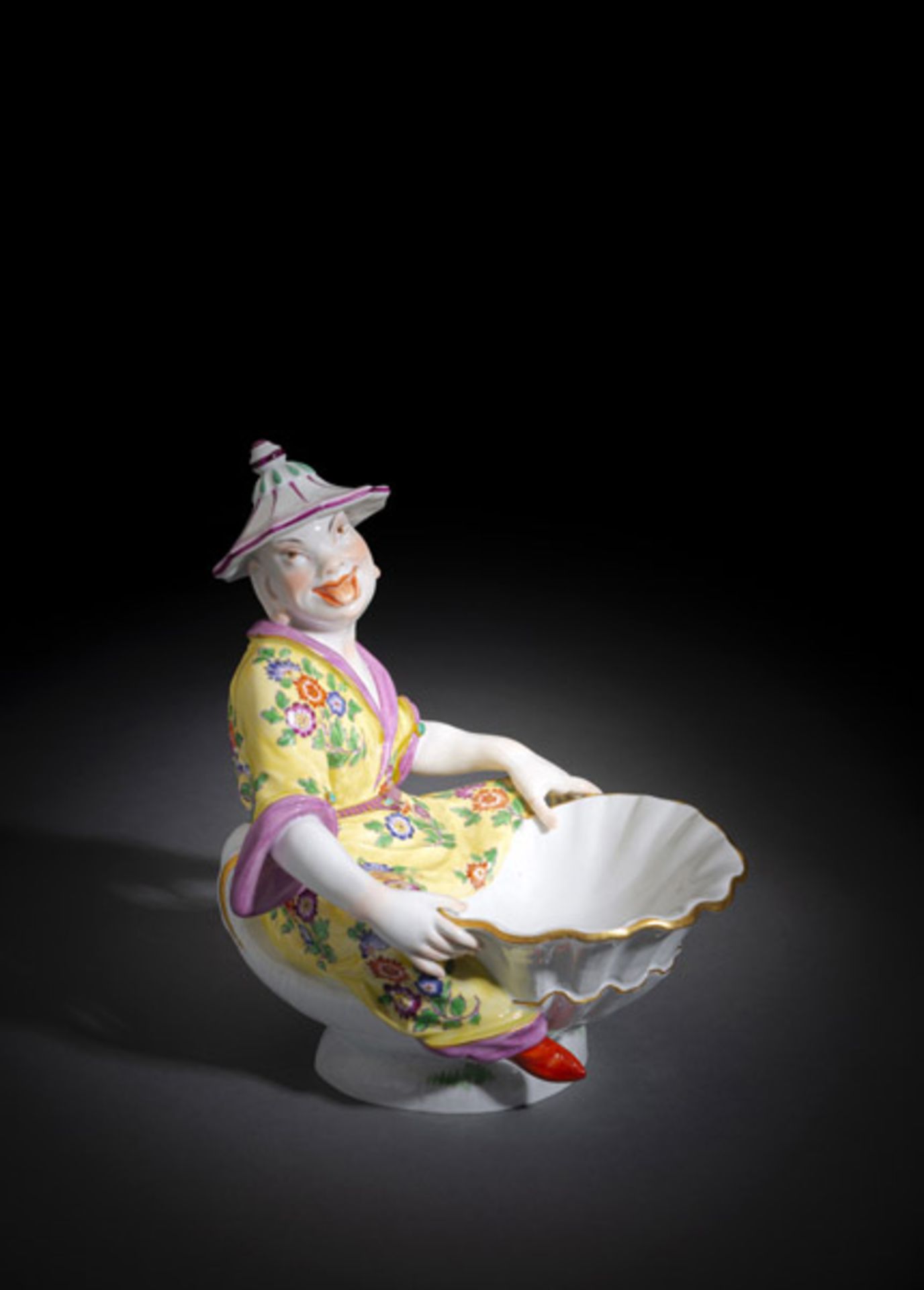 A MEISSEN CHINESE FIGURE WITH SPICE BOWL