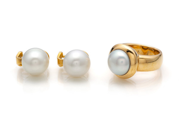 A PAIR OF EARRINGS AND A RING WITH SOUTH SEA CULTURED PEARLS