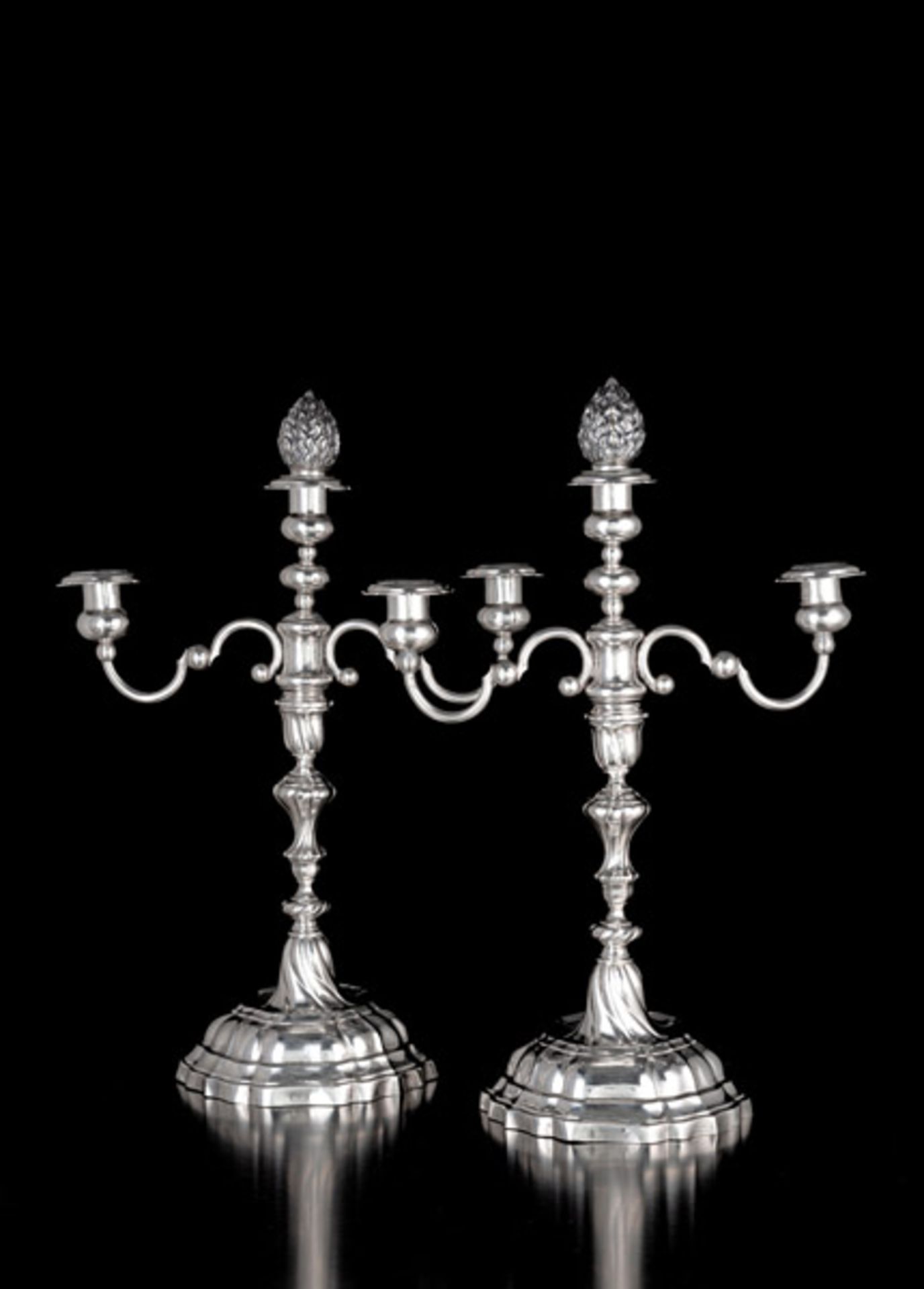 A PAIR OF AUGSBURG ROCOCO CANDLESTICKS