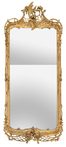 A GERMAN CARVED MIRROR