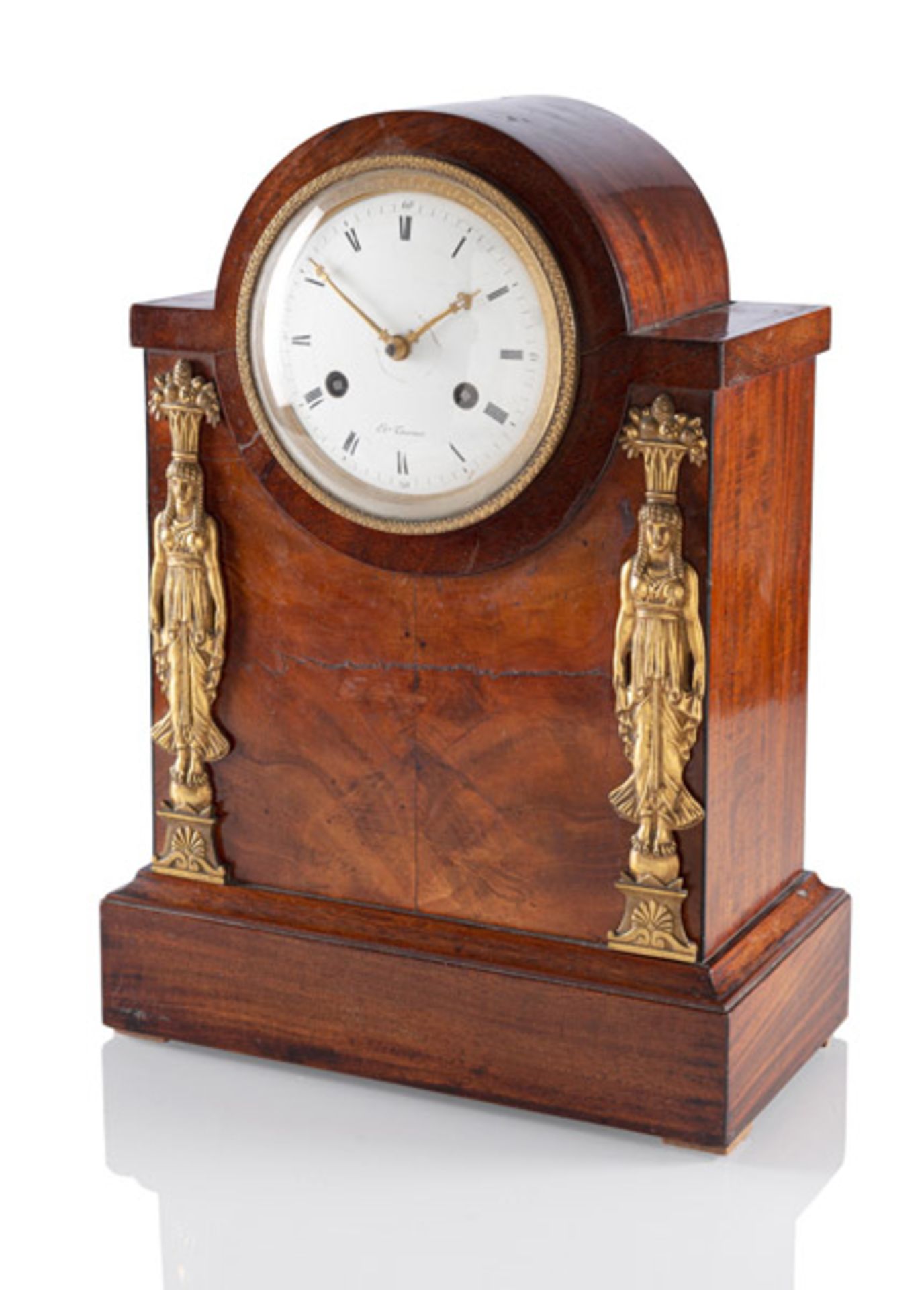 A NEOCLASSICAL BRASS MOUNTED MAHOGANY PENDULE