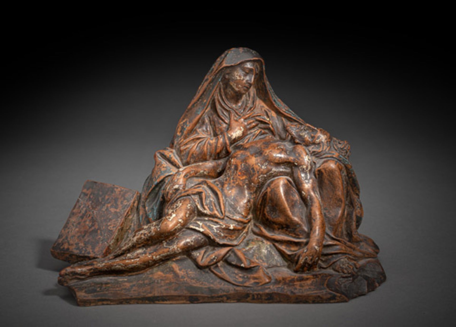 A FINE TERRACOTTA PIETA GROUP