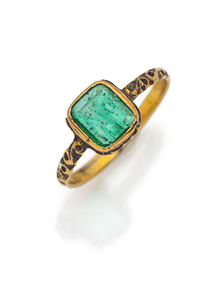 AN EMERALD RING