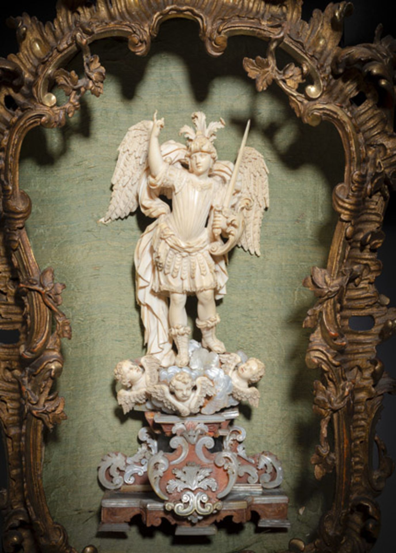 A FINELY CARVED IVORY FIGURE OF ST. MICHAEL IN A DECORATIVE FRAME - Image 2 of 4