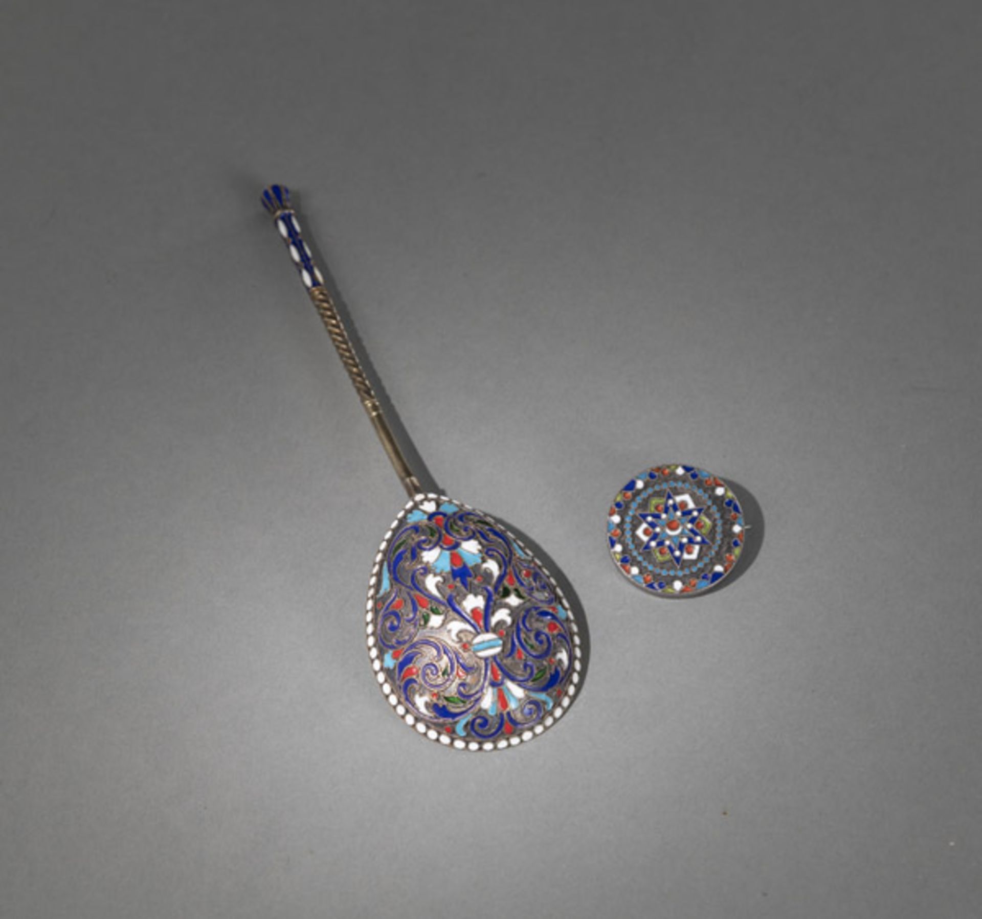 AN ENAMELLED SILVER SPOON AND A CLOTHING BUTTON AS BROOCH - Image 2 of 3