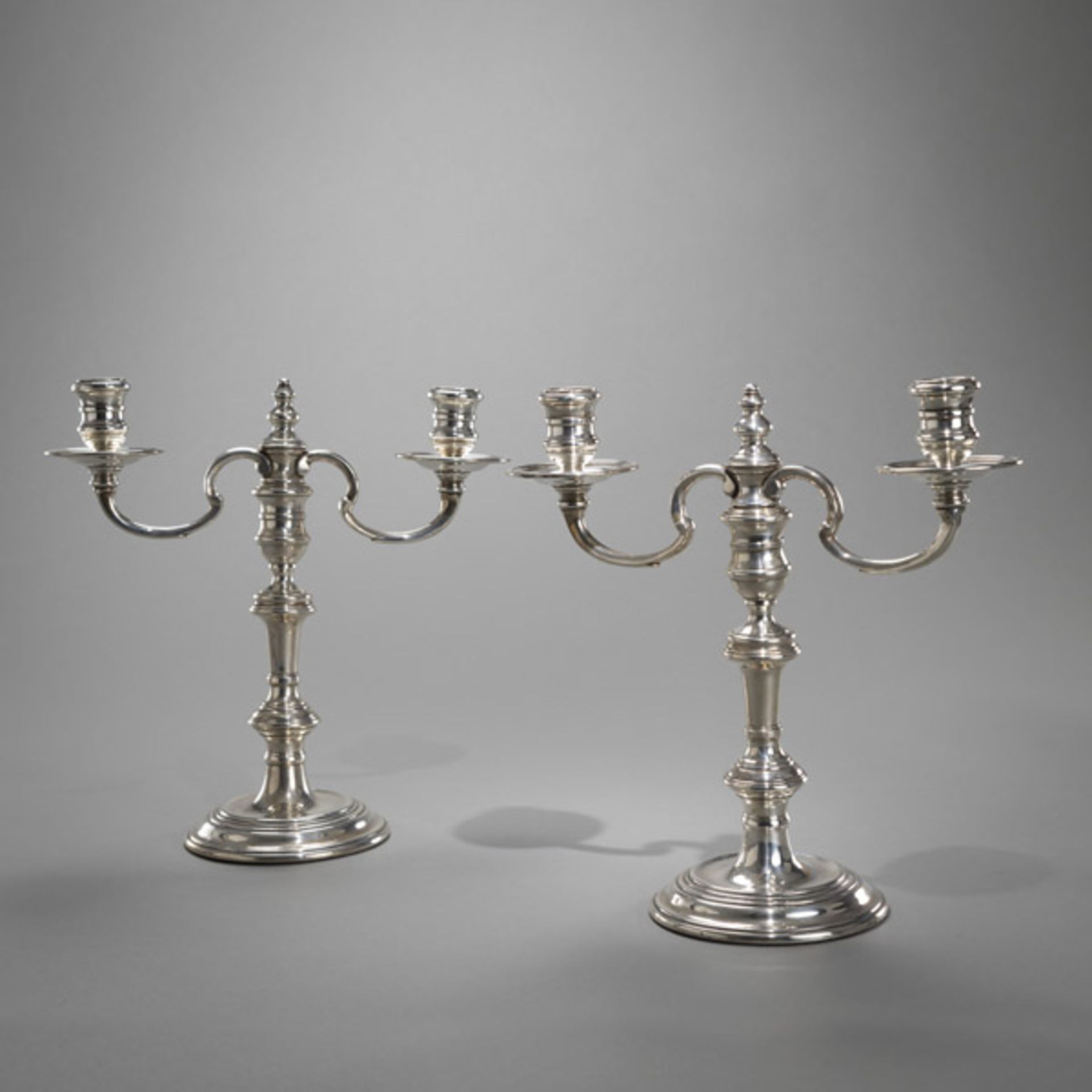 A PAIR OF ENGLISH TWO LIGHT SILVER CANDELABRA
