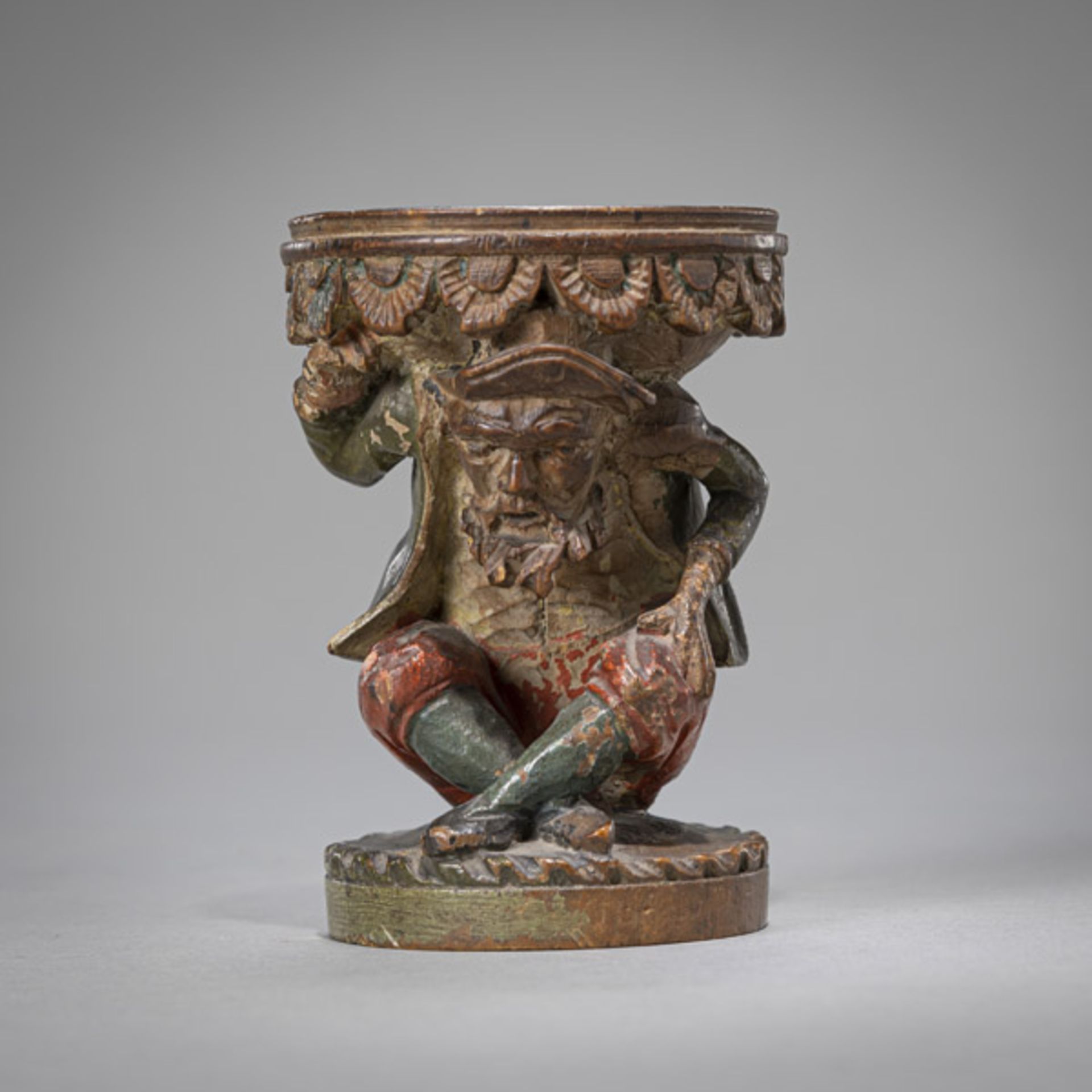 A CARVED WOOD MODEL OF A BASIN WITH ATLANT