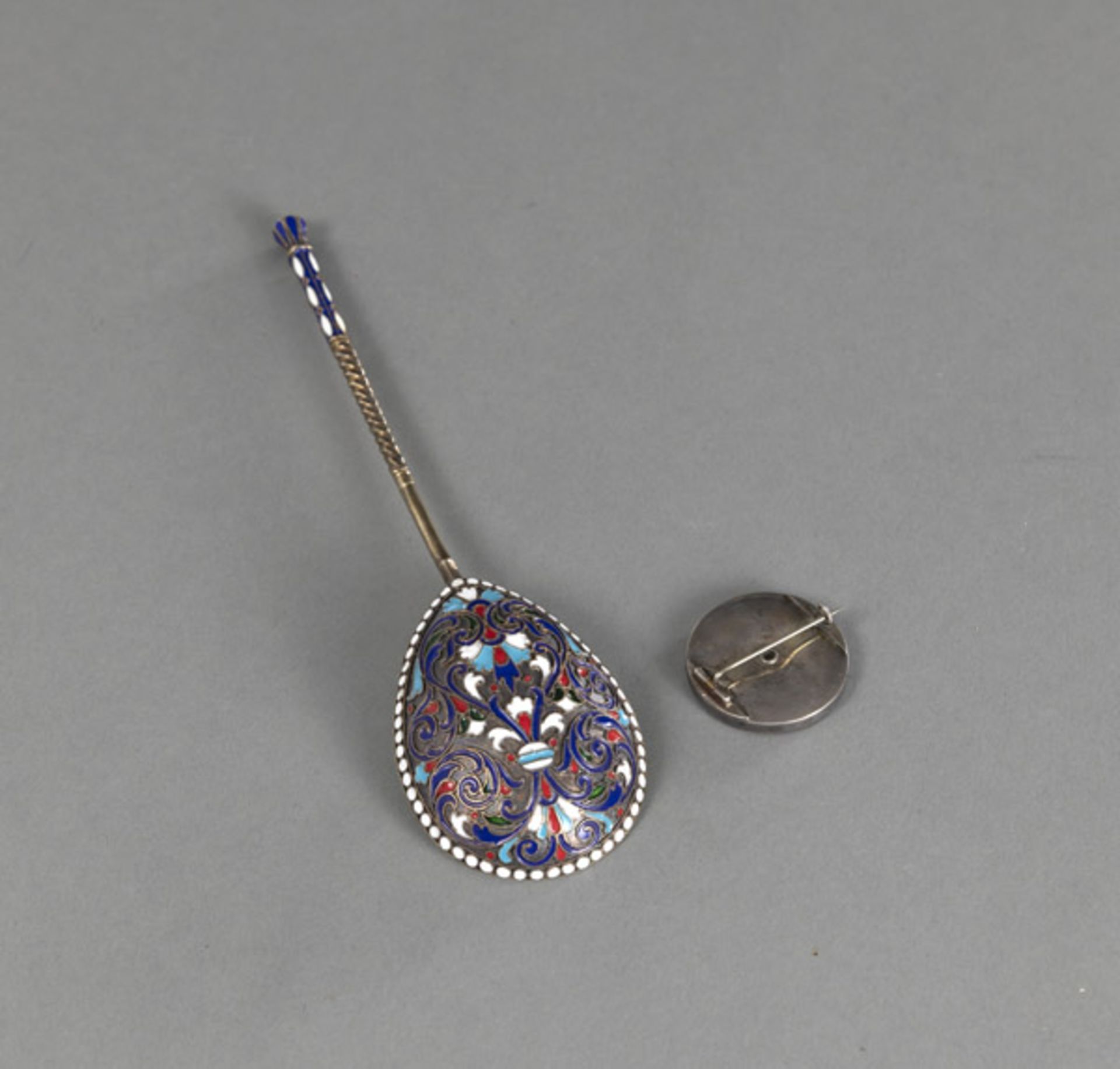 AN ENAMELLED SILVER SPOON AND A CLOTHING BUTTON AS BROOCH - Image 3 of 3