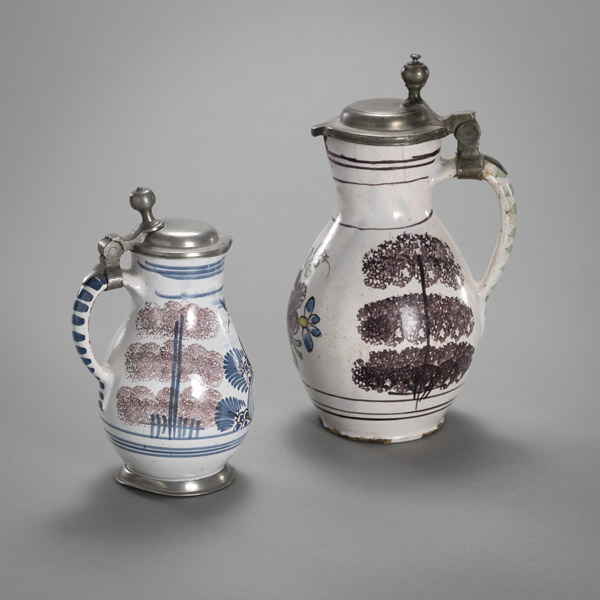 TWO GERMAN PEWTER MOUNTED FAIENCE SMALL JARS