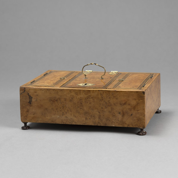A FINE METAL MOUNTED ROOTWOOD CASKET