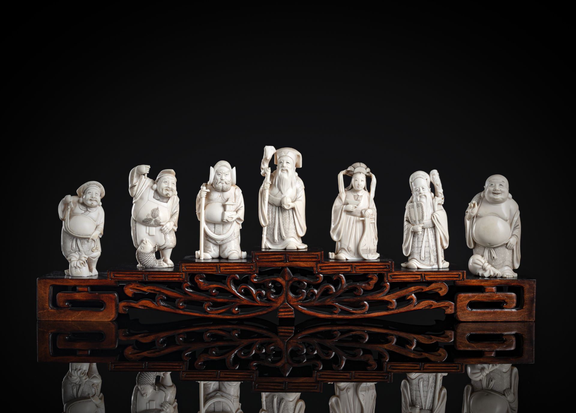 A GROUP OF SEVEN IVORY OKIMONO OF SHICHIFUKUJIN