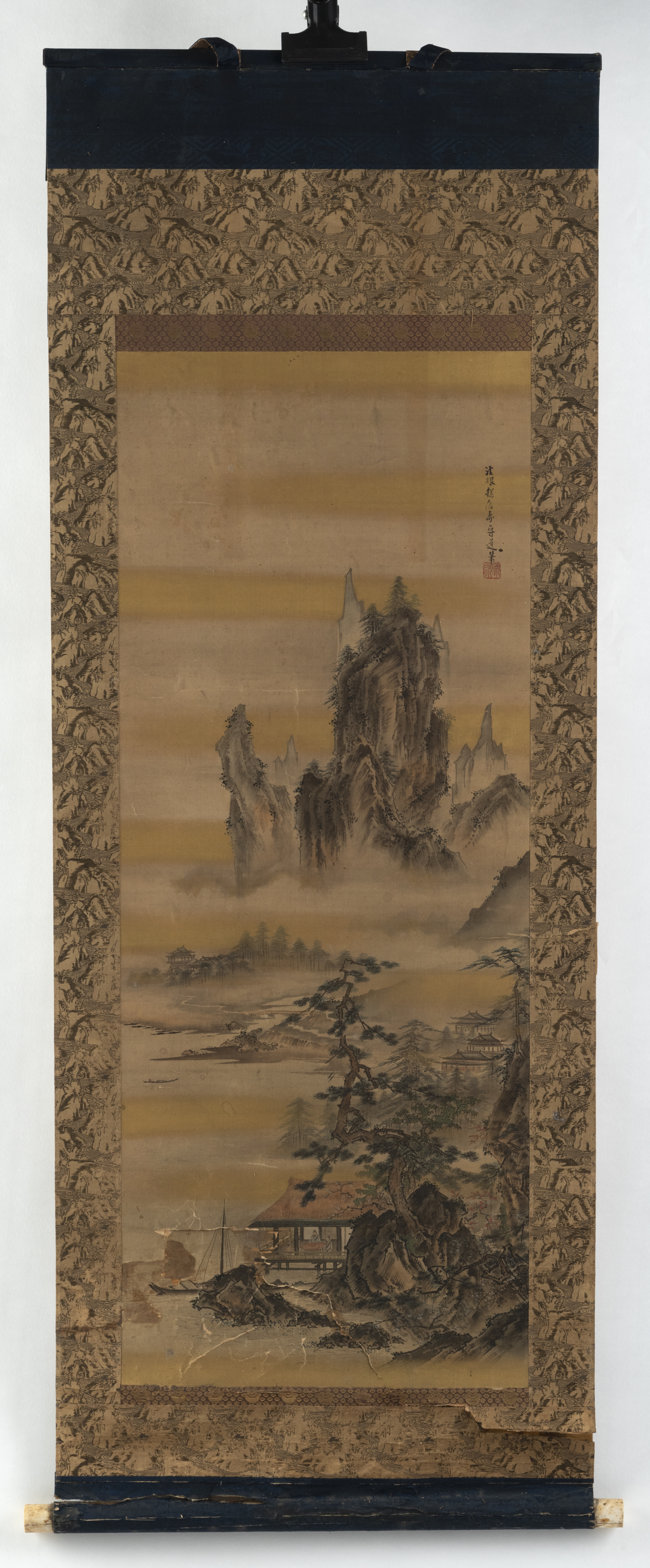 A HANGING SCROLL DEPICTING A LANDSCAPE WITH A SCHOLAR'S SUDIO AFTER KANO TANSHIN. INK AND COLORS ON - Image 2 of 3