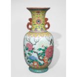 A FINE AND LARGE FAMILLE ROSE LOTUS AND FLOWER VASE