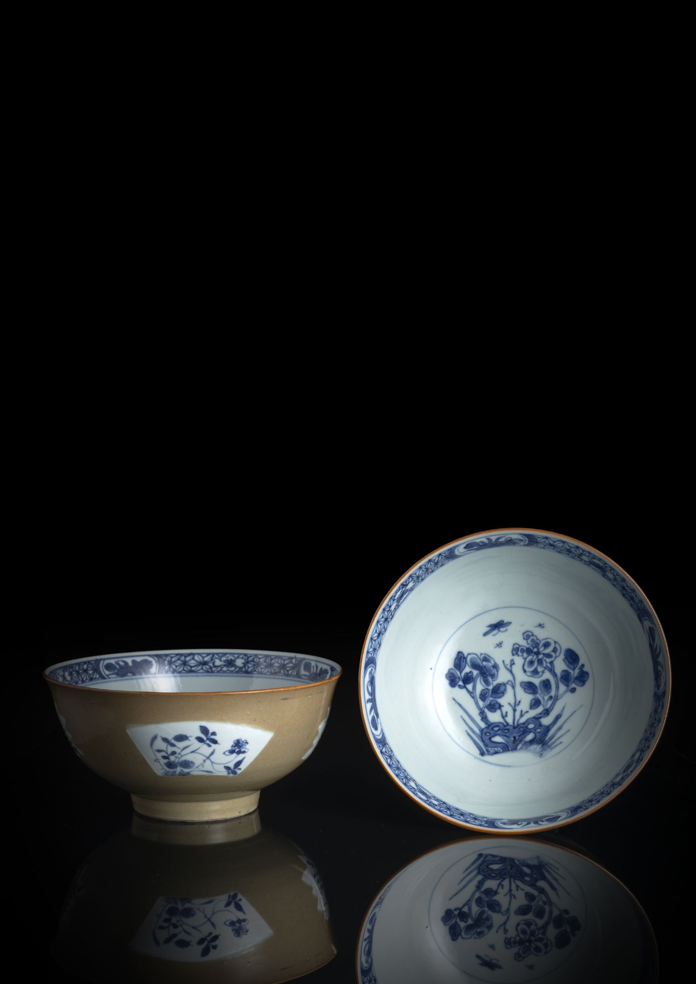 A RARE PAIR OF BLUE AND WHITE AND CAFÉ-AU-LAIT GROUND PORCELAIN BOWLS FROM THE COLLECTION OF FREDER