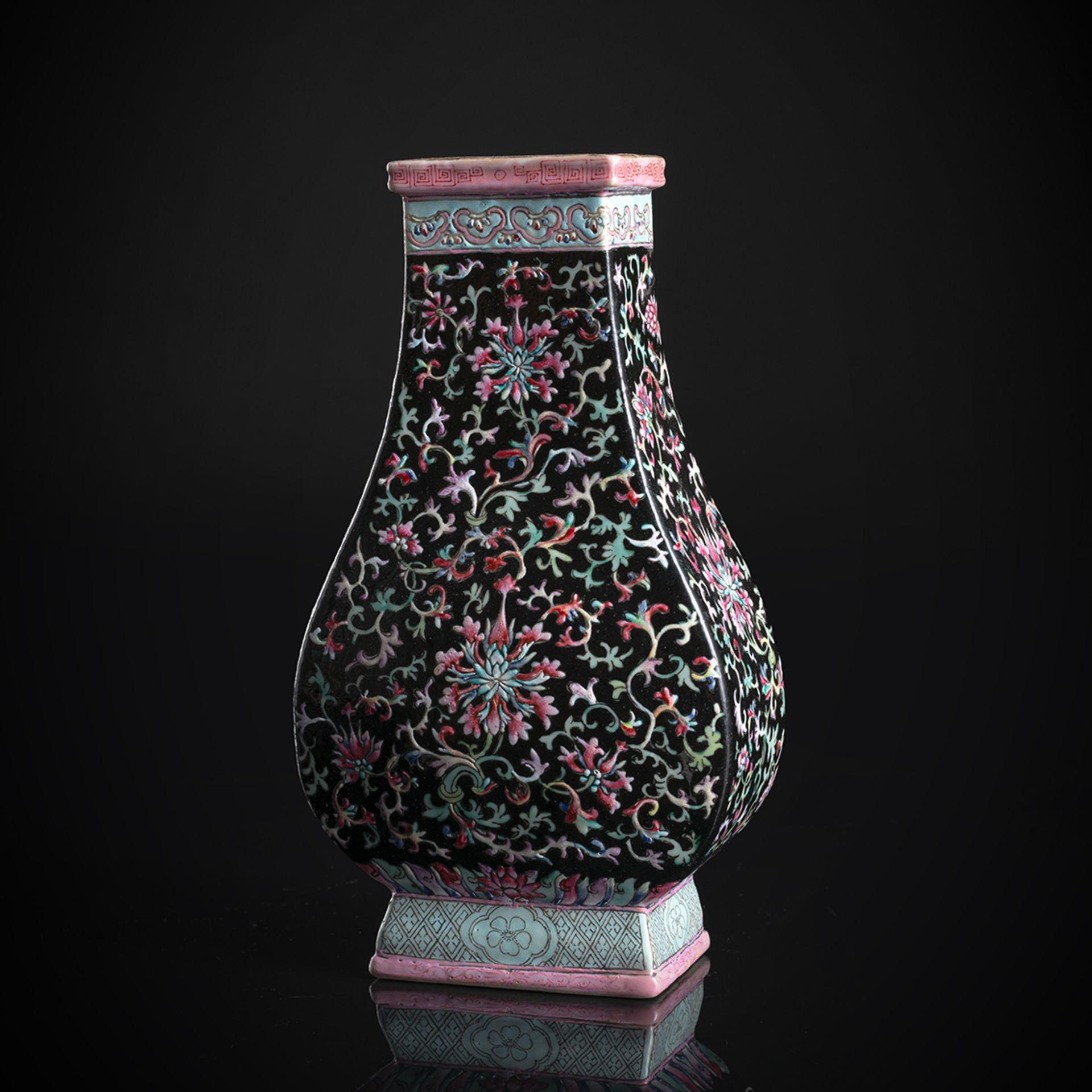 A BLACK-GROUND FAMILLE ROSE LOTUS PORCELAIN HU VASE