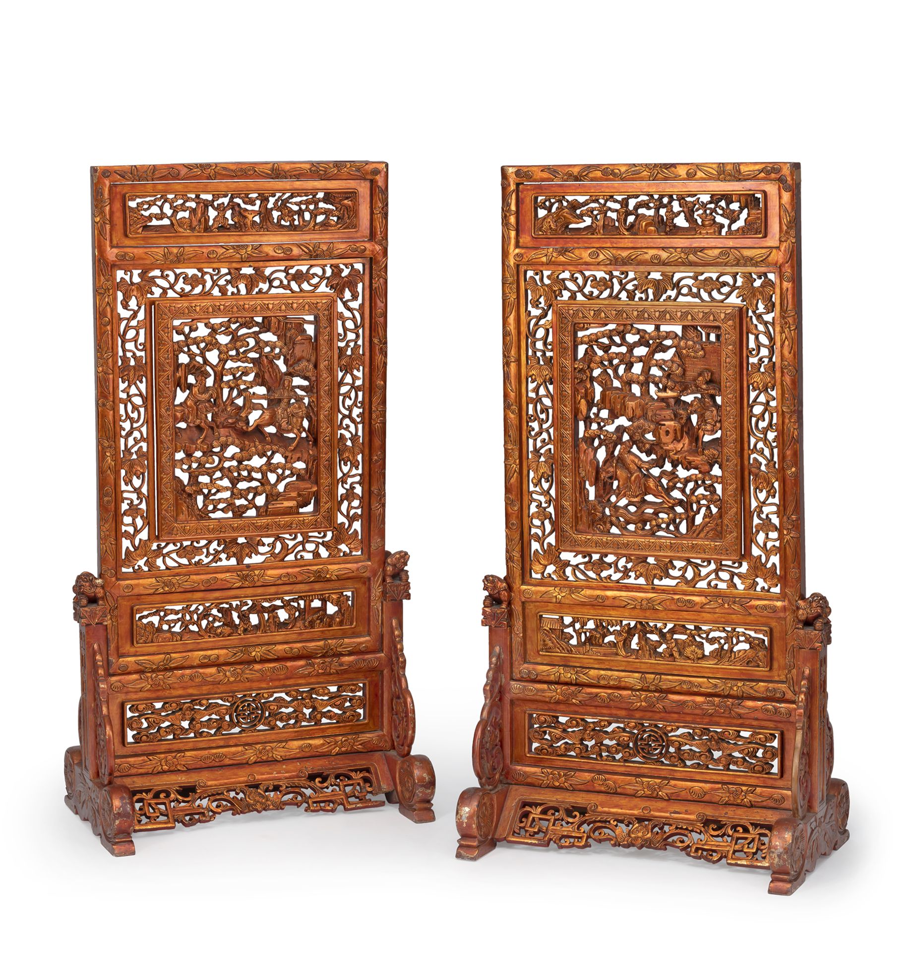 TWO LARGE WOOD TABLE SCREENS, PARTLY CARVED IN OPENWORK WITH WARRIORS IN A MOUNTAIN LANDSCAPE AND V