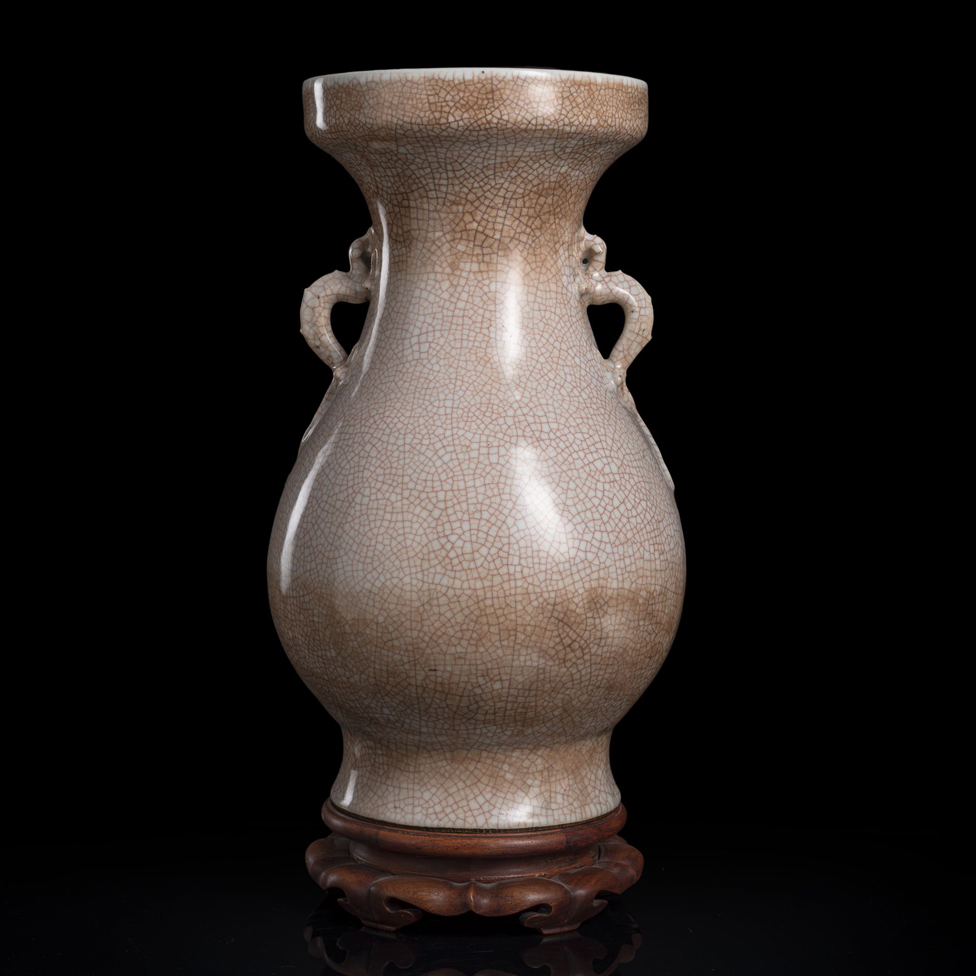 A BEIGE-GLAZED CRACKLED PORCELAIN VASE WITH CHILONG HANDLES