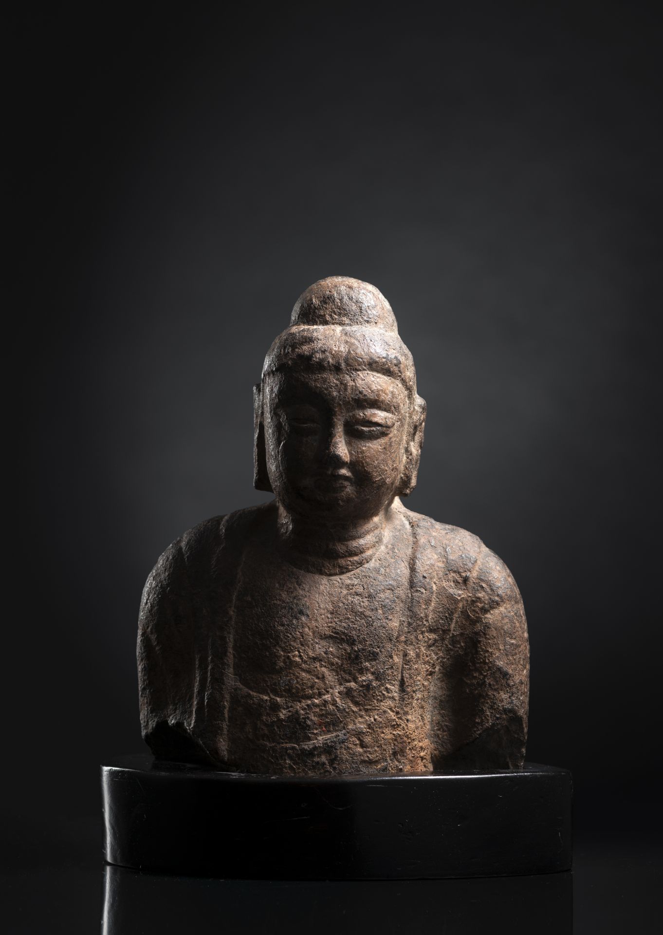 A LIMESTONE BUST OF BUDDHA SHAKYAMUNI