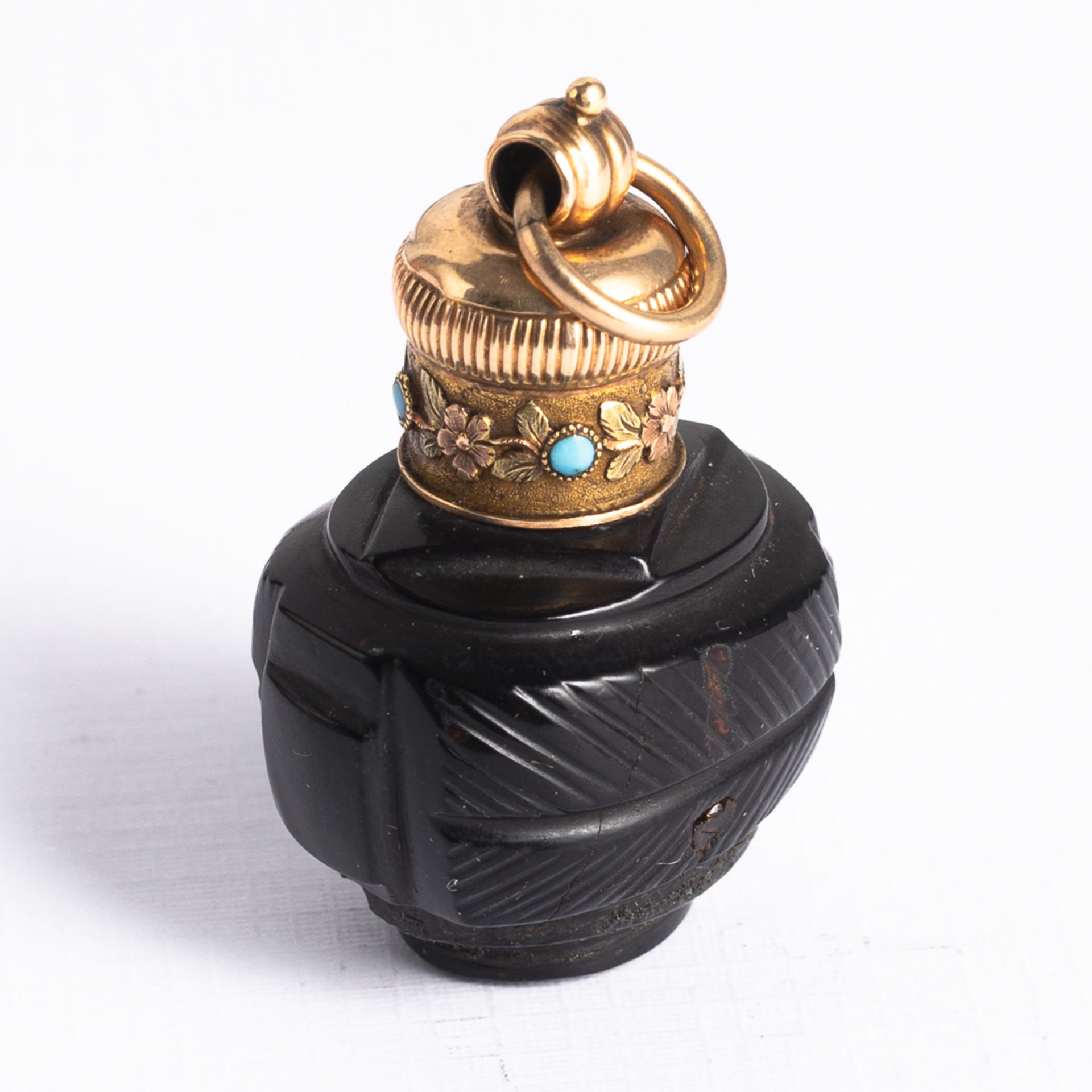 A SMALL GILT-SCREW TOP FLASK