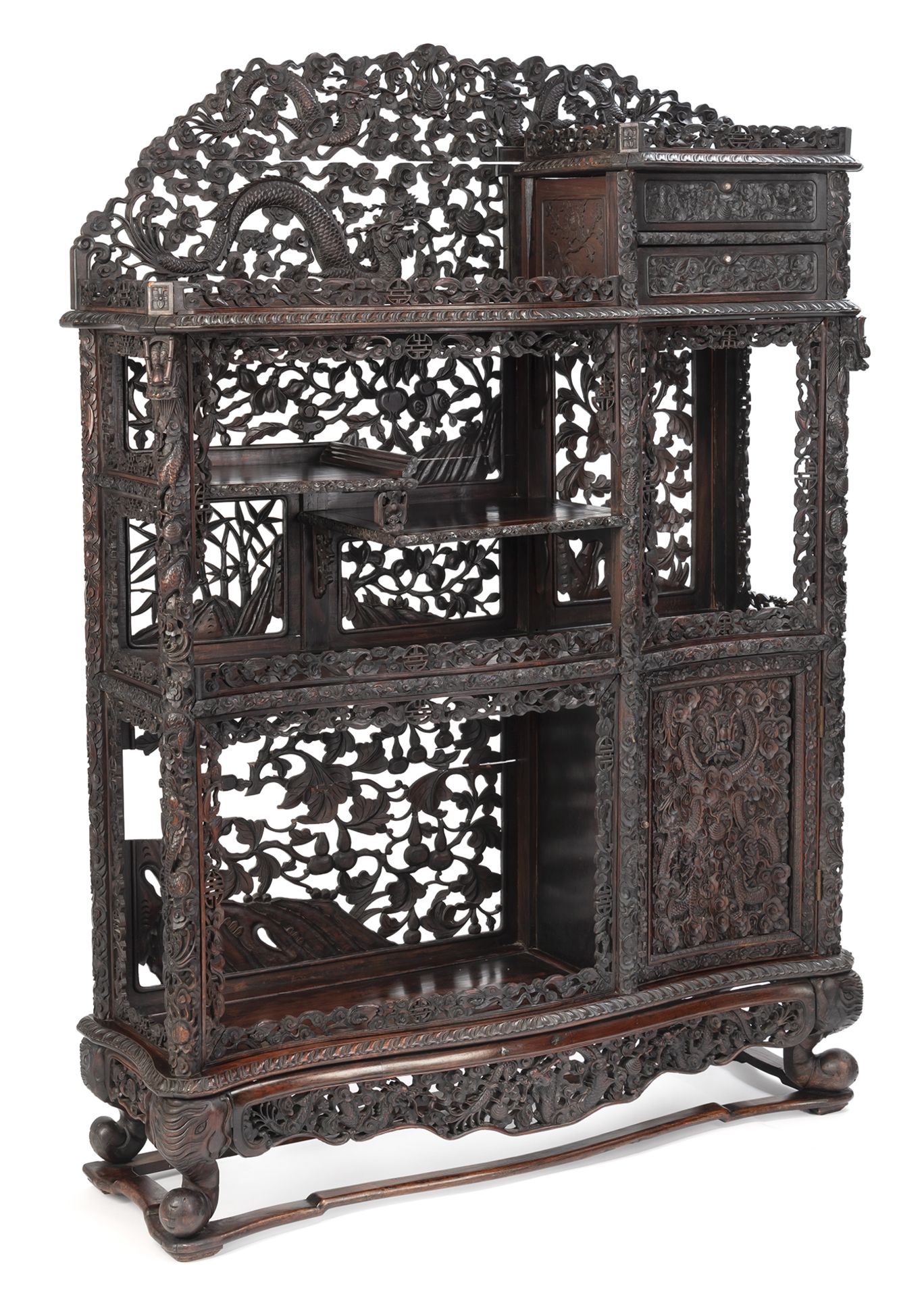 AN INTRICATELY CARVED OPENWORK DRAGON, QILIN, BAMBOO AND POMEGRANATE DISPLAY CABINET