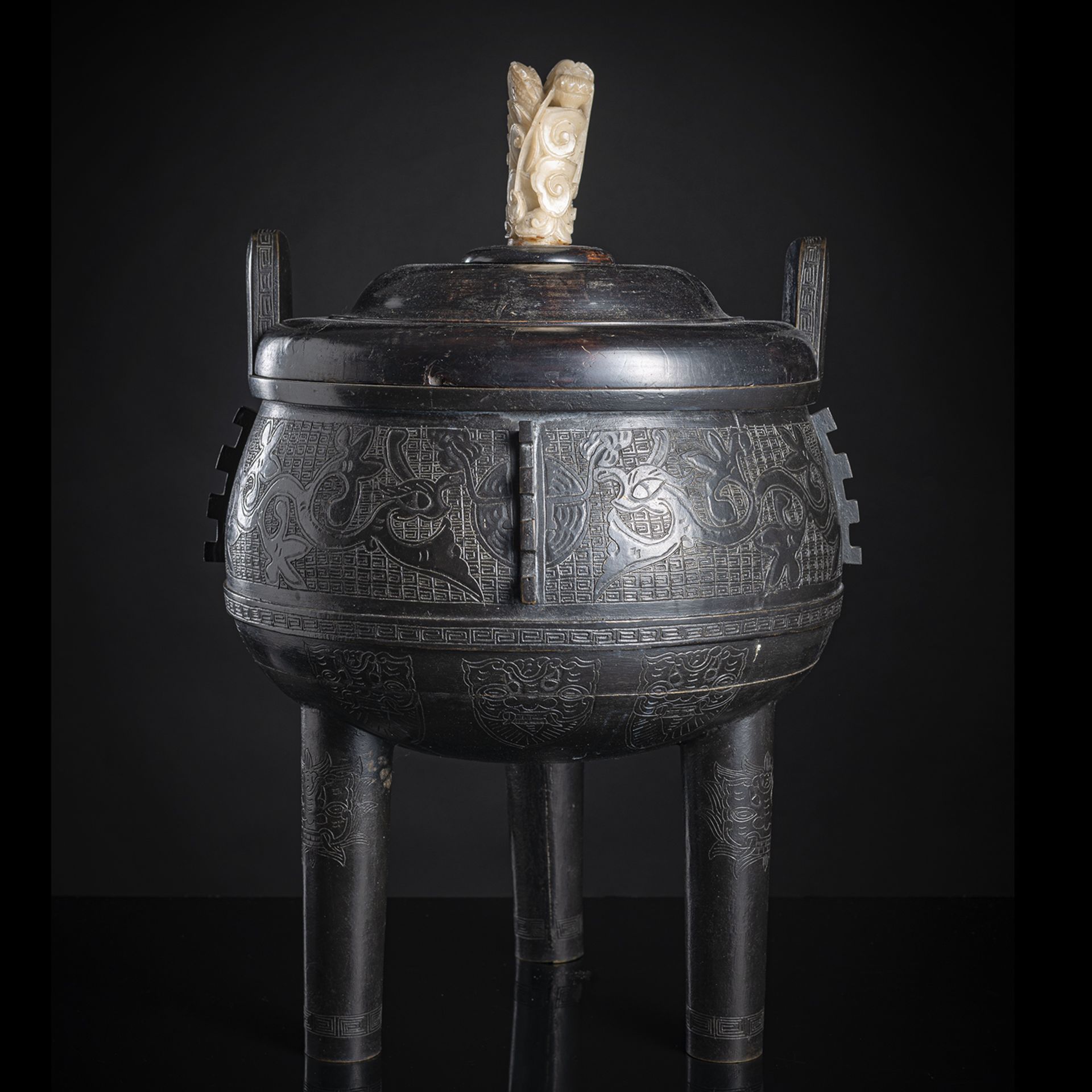 A LARGE TRIPOD CENSER DING WITH WOOD COVER AND STONE HANDLE