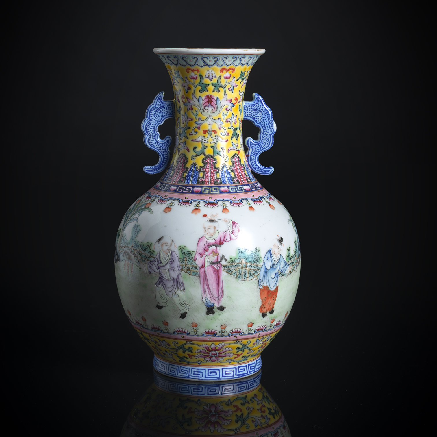 A TWIN-HANDLED 'FAMILLE ROSE' 'PLAYING BOYS' PORCELAIN VASE