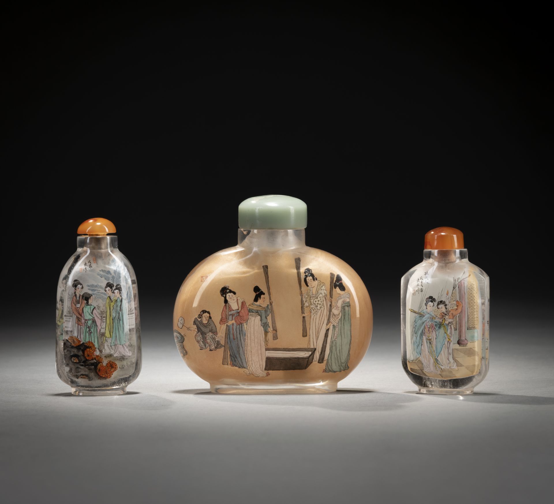 THREE GLASS SNUFF BOTTLES WITH INSIDE PAINTING DEPICTING COURT LADIES