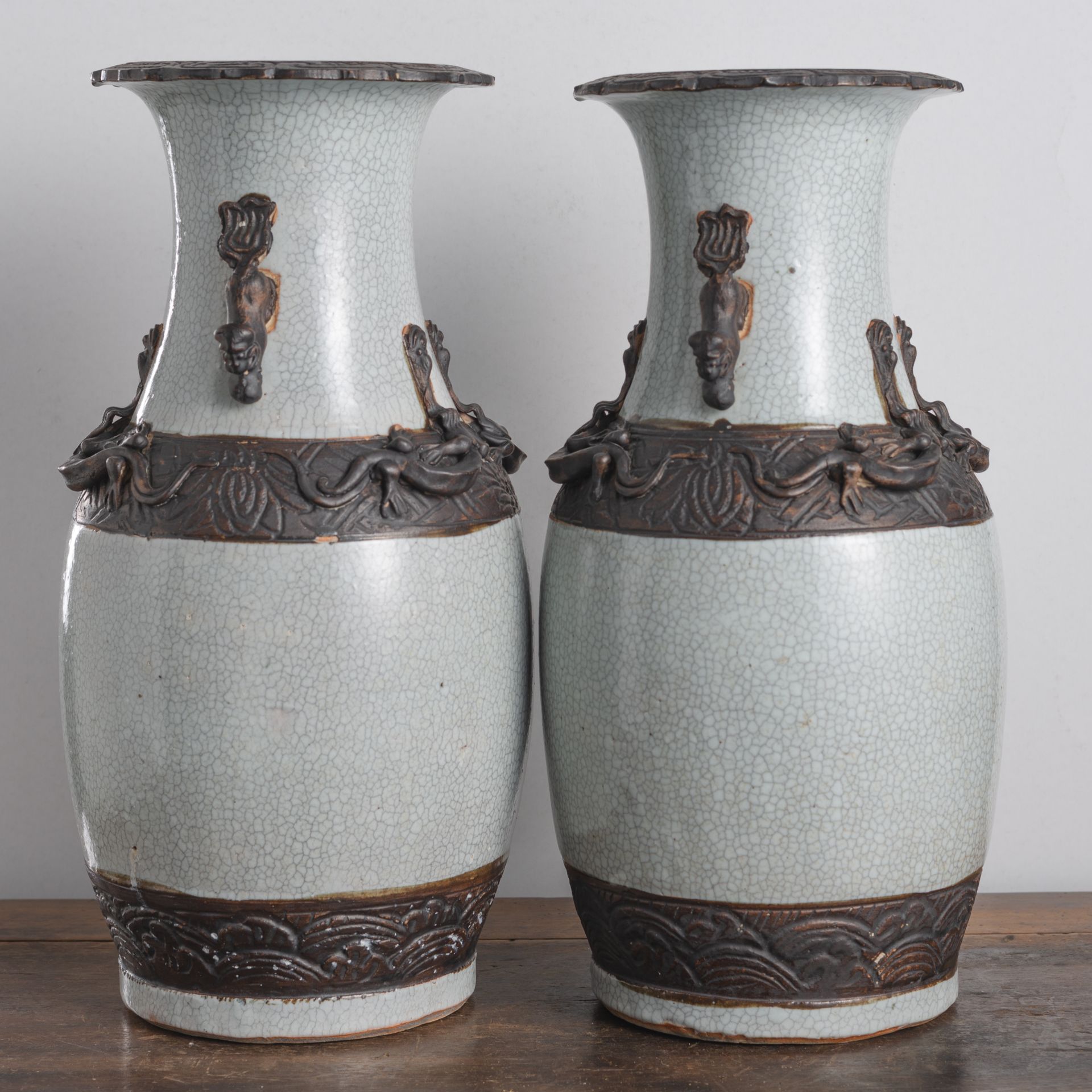 A PAIR OF RELIEF PORCELAIN VASES - Image 2 of 6