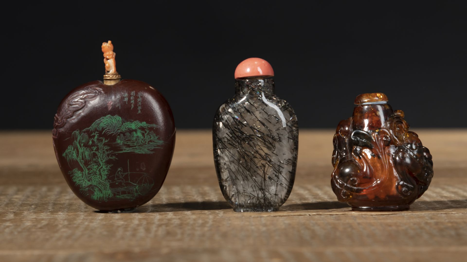 TWO SNUFF BOTTLES MADE OF QUARTZ AND CARVED, PAINTED NUT AND ANOTHER SNUFF BOTTLE CARVED WITH CHILO - Image 2 of 2