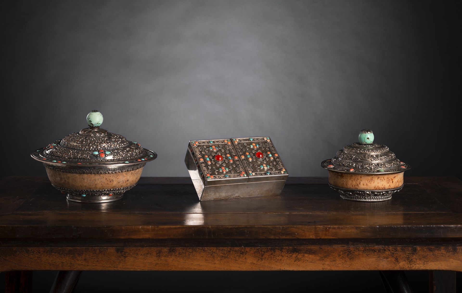 A SILVER MOUNTED AND STONE INLAID BURLWOOD BOWL AND COVER AND ANOTHER SILVERED COPPER BOWL AND COVE