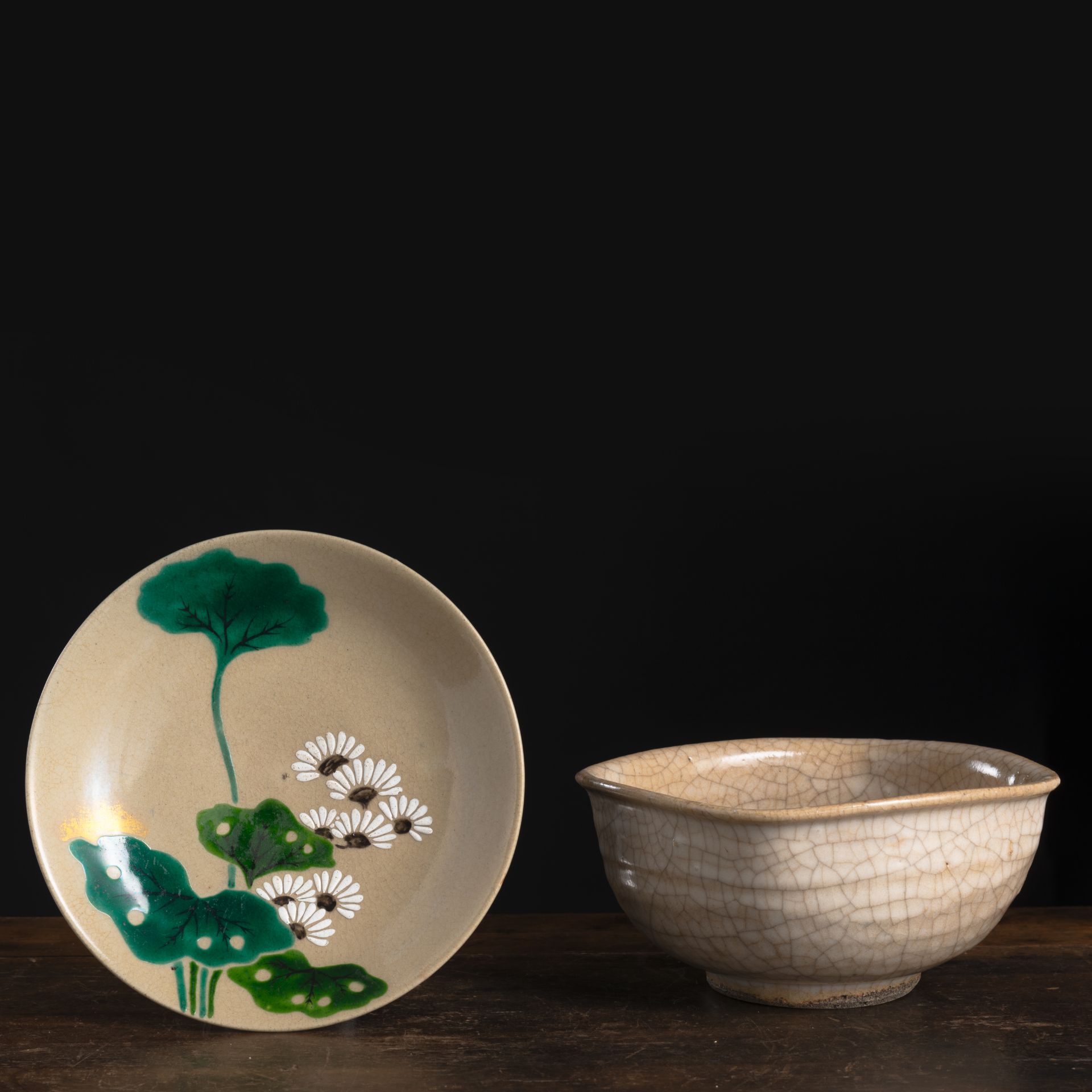 A QUASI-SQUARE CREAM-BROWN GLAZED CERAMIC BOWL AND A POLYCHROME PAINTED DISH FOR THE TEA CEREMONY