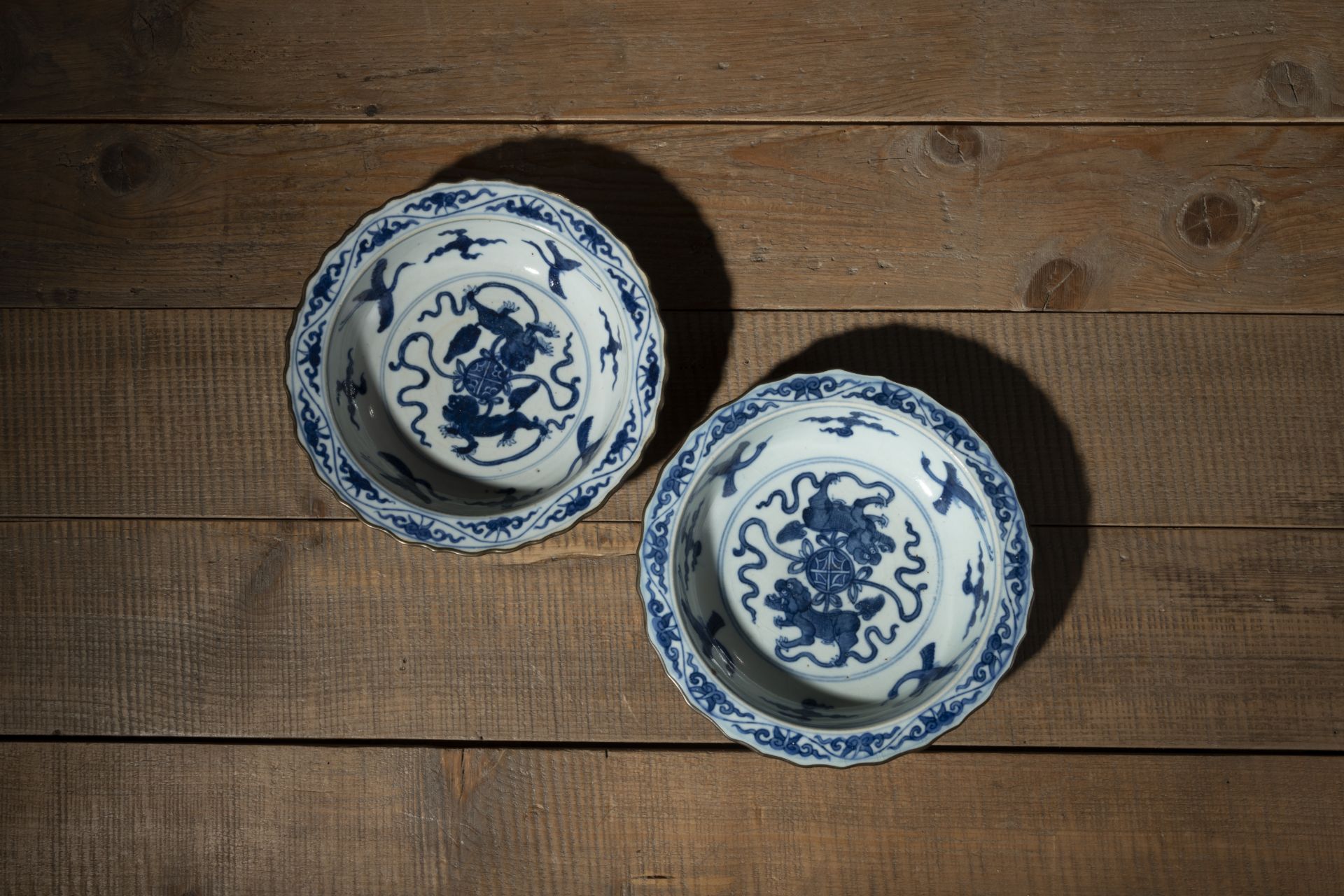 TWO FLORIFORM BLUE AND WHITE MYTHICAL CREATURE DISHES - Image 2 of 3