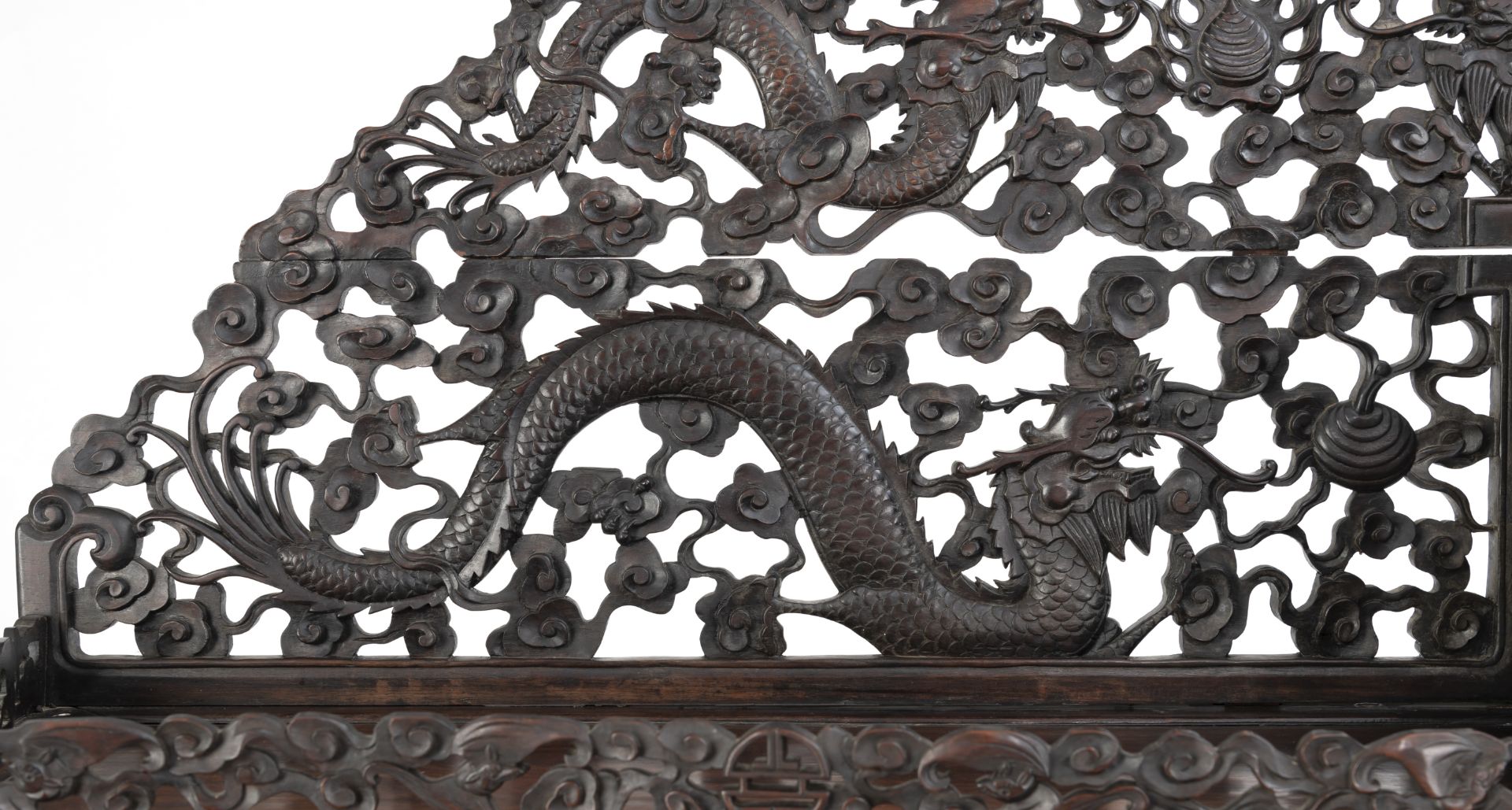 AN INTRICATELY CARVED OPENWORK DRAGON, QILIN, BAMBOO AND POMEGRANATE DISPLAY CABINET - Image 8 of 8