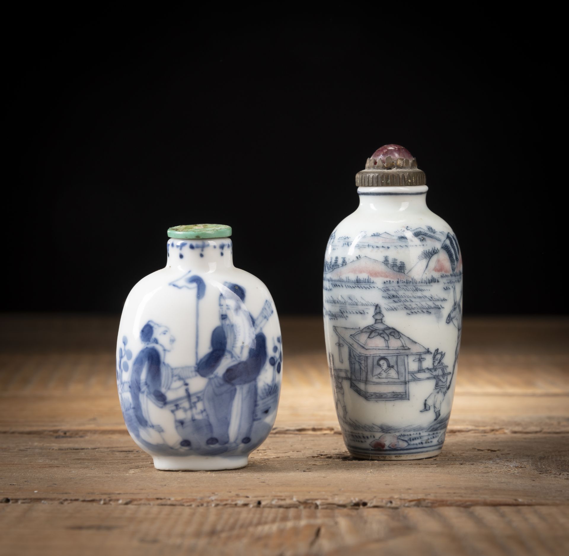 TWO BLUE AND WHITE PORCELAIN SNUFF BOTTLES DEPICTING THE WEDDING OF ZHONG KUI'S SISTER AND A MEETIN