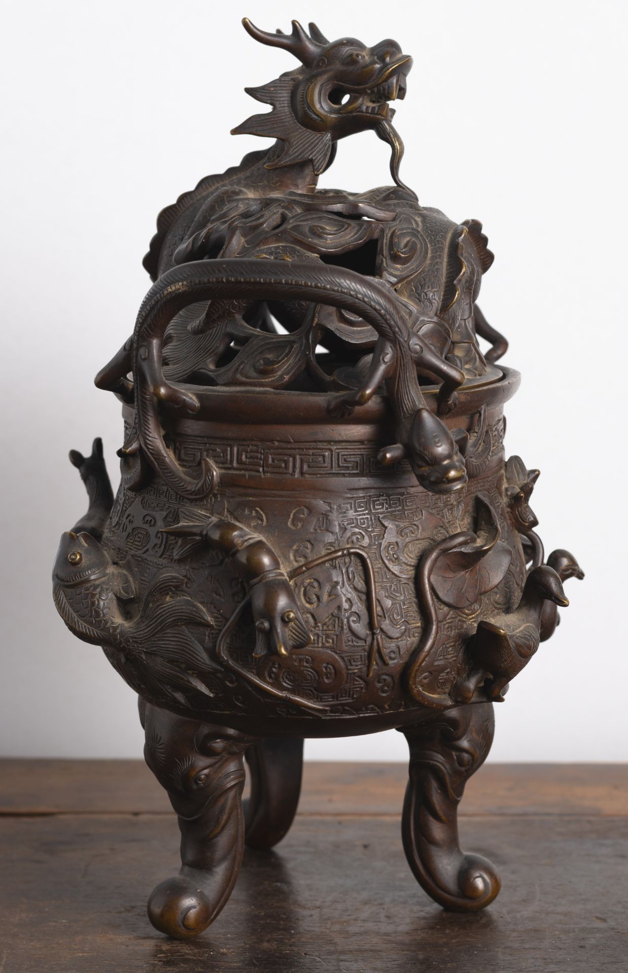 A GOOSE, HORSE, AND FISH RELIEF TRIPOD BRONZE CENSER AND OPENWORK DRAGON COVER - Image 3 of 6