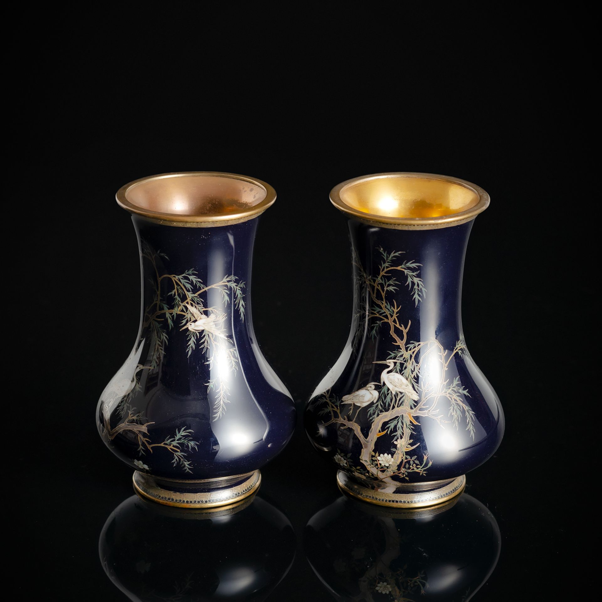 A FINE PAIR OF CLOISONNÉ ENAMEL VASES WITH BRIDS AND WILLOW TREES NEAR FLOWERS ON DARK-BLUE GROUND