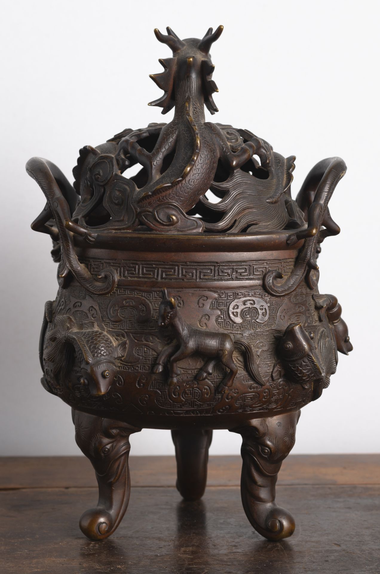 A GOOSE, HORSE, AND FISH RELIEF TRIPOD BRONZE CENSER AND OPENWORK DRAGON COVER - Image 5 of 6