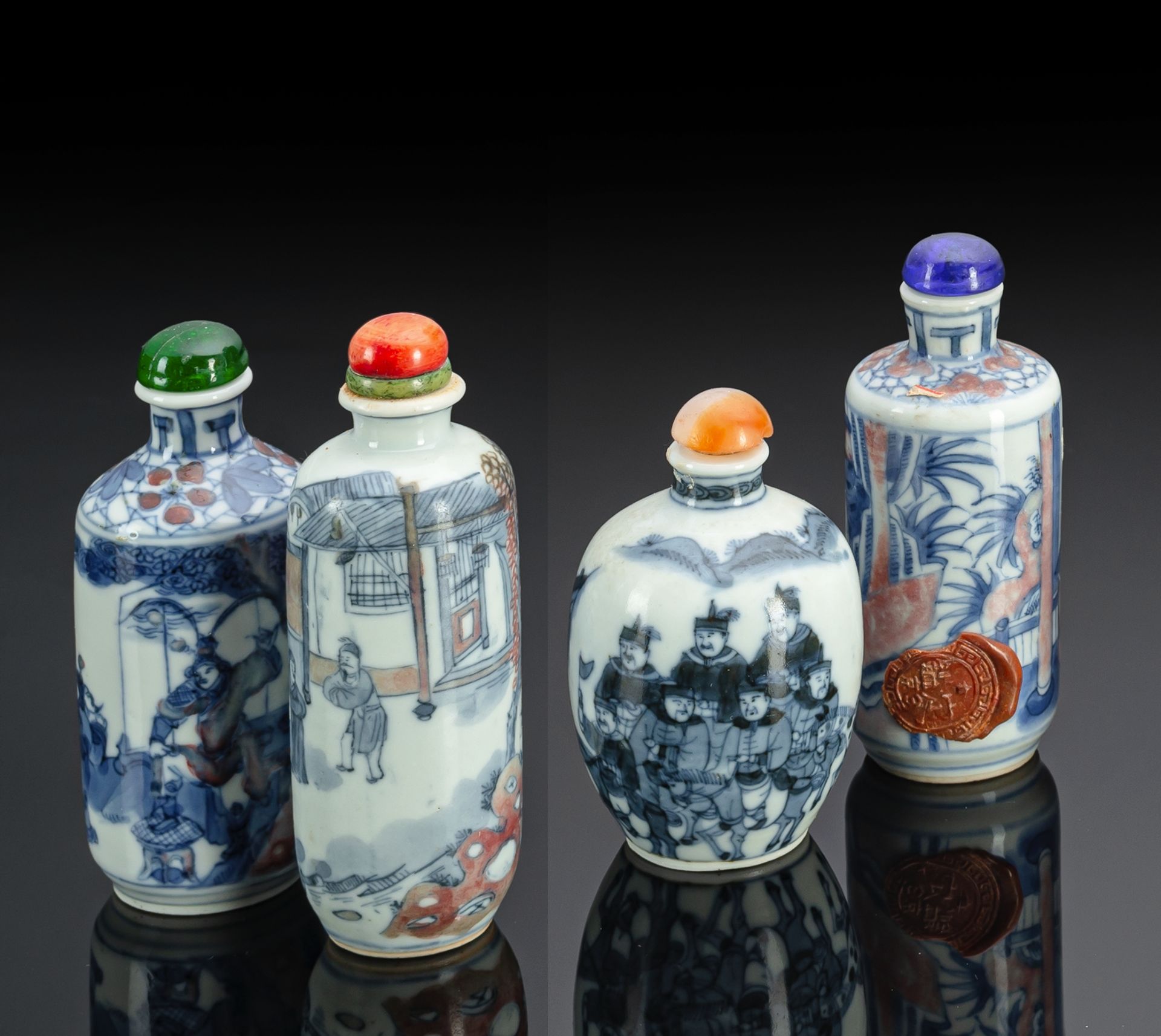 A GROUP OF FOUR COPPER-RED AND UNDERGLAZE DECORATED SNUFFBOTTLES